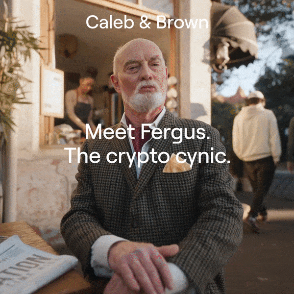 Fergus crypto denier sat at cafe for his character portrait.