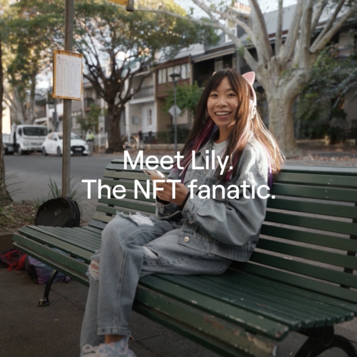 Lily NFT fanatic sat on bench for her character portrait.