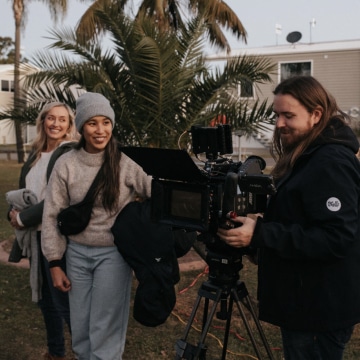 Shea behind the camera on set for Ingenia Holidays South Coast campaign