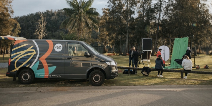 Chello van on set down the south coast with green screen setup to make a man fly.